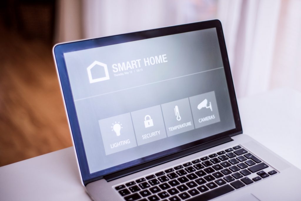 A laptop with smart home screen.